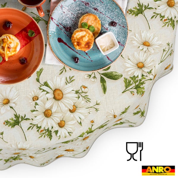 Abwaschbare Tischdecke aus Wachstuch mit Gänseblümchen-Muster, lebensmittelecht, ANRO Logo.
