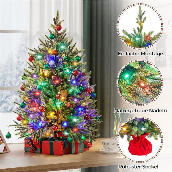 Geschmückter Weihnachtsbaum mit Beleuchtung und Geschenken