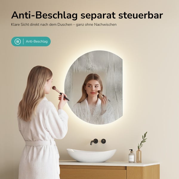 Runder Badezimmerspiegel mit LED-Beleuchtung und Anti-Beschlag-Funktion für eine klare Sicht, in einem hellen, modernen Badezimmer.