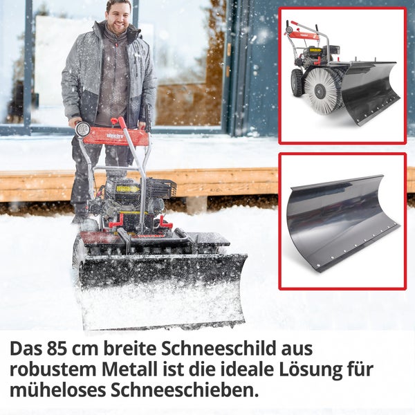 Mann benutzt Hecht Schneeschild zum Schneeräumen vor dem Haus. Nahaufnahme des Schneeschildes und des Bürstenaufsatzes.