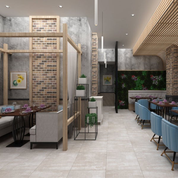 Innenansicht eines Restaurants mit Tischen, Stühlen und Dekorationen