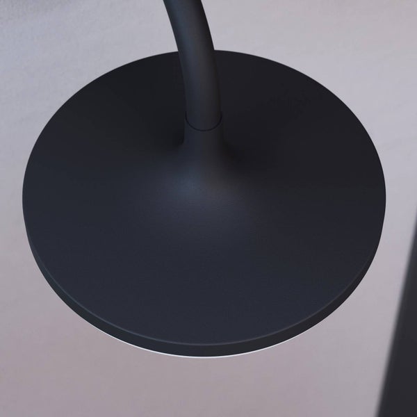 Moderne Wandleuchte mit runder Form und matter Oberfläche.