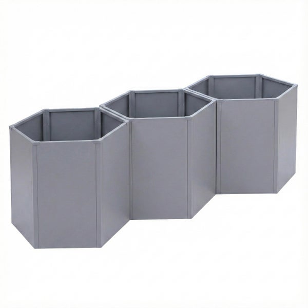 Dreiteiliges graues Hochbeet-System aus Metall in Wabenform.