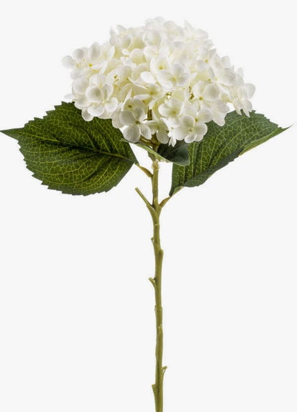 Künstlicher Dekozweig mit weißen, flauschigen Pompon-Blüten an einem grünen Stiel.