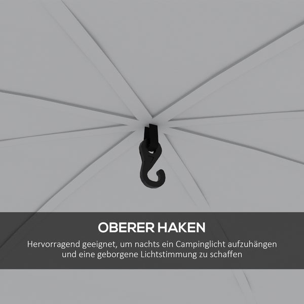 Pavillon mit Gartenmöbeln auf einer Wiese