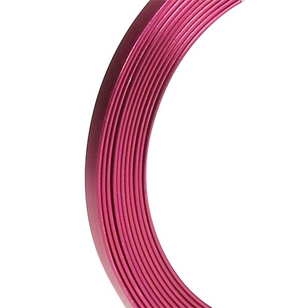 Flexibler Kantenumleimer aus Kunststoff mit gerippter Oberfläche in Pink.