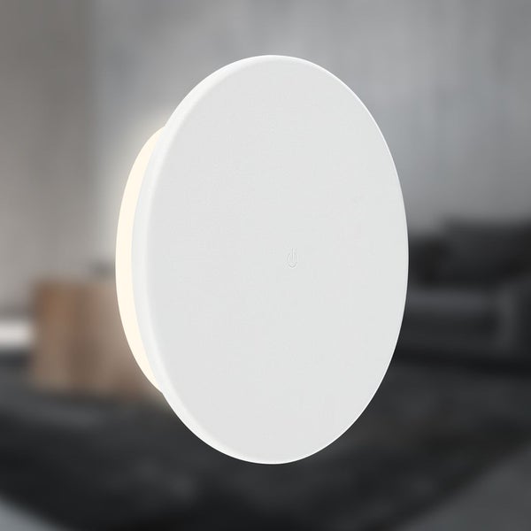 Runde LED Wandleuchte mit Touchschalter zur Beleuchtung von Wohnräumen.