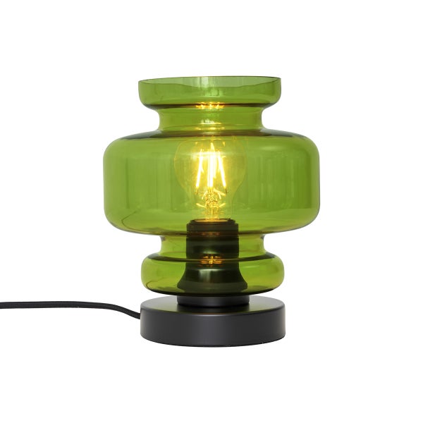 Grüne Tischleuchte aus Glas mit schwarzem Sockel und Glühbirne