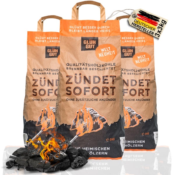 Grill mit brennender Holzkohle und Gluh Gut Holzkohle Verpackung im Hintergrund. Symbole weisen darauf hin, dass keine Flüssigkeiten zum Anzünden verwendet werden dürfen und dass der Grill nicht in Innenräumen verwendet werden darf.
