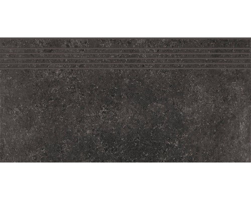 Dunkle Treppenfliese mit Rillen