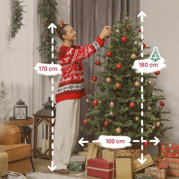 Eine 170 Zentimeter große Frau dekoriert einen 180 Zentimeter hohen und 100 Zentimeter breiten künstlichen Weihnachtsbaum.