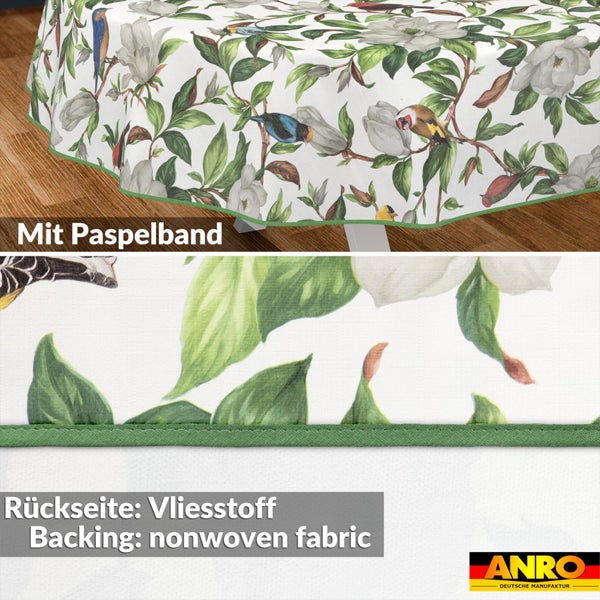 Tischdecke mit Vögeln und Magnolien, Paspelband und Vliesstoff-Rückseite. ANRO Logo.