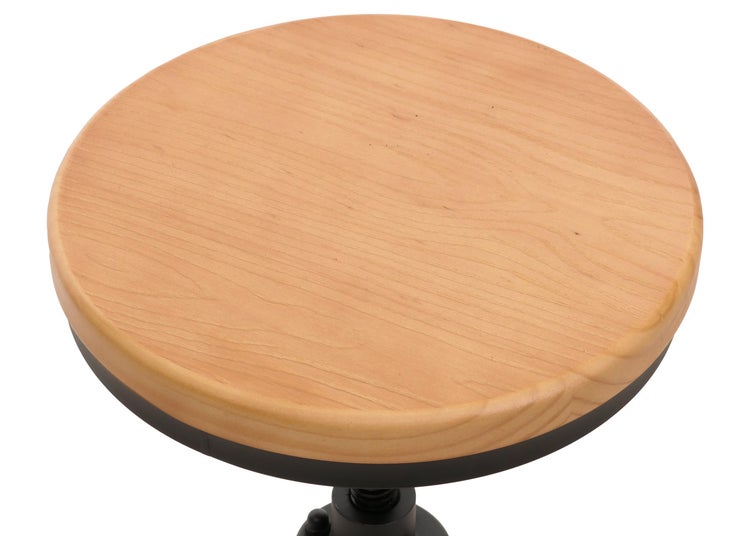 Runde Sitzfläche eines Hockers aus Holz