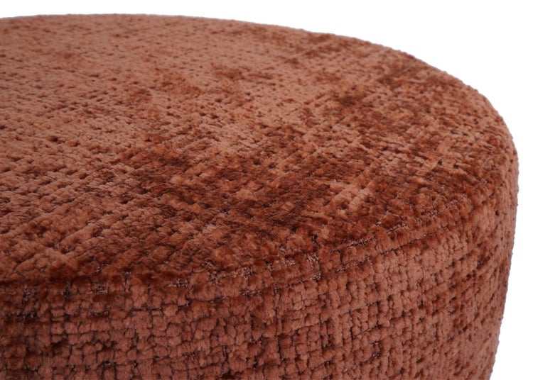 Detailansicht eines runden Poufs mit Textilbezug