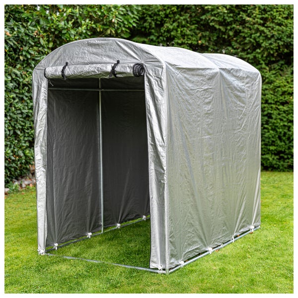 Mobiles Lagerzelt aus silberner Folie mit Metallrahmen und aufrollbarem Eingang auf einer Rasenfläche.
