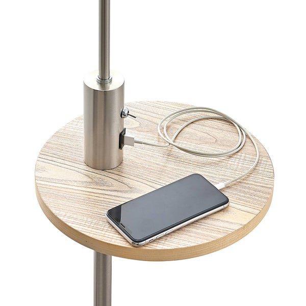 Tischleuchte mit USB-Anschluss und Mobiltelefon auf Holztisch