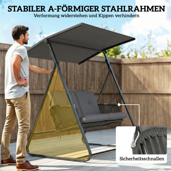 Moderne Hollywoodschaukel in einem hellen Garten mit stabilem A-förmigem Stahlrahmen, grauem Sonnendach, Seilgeflecht und Sicherheitsschnallen.