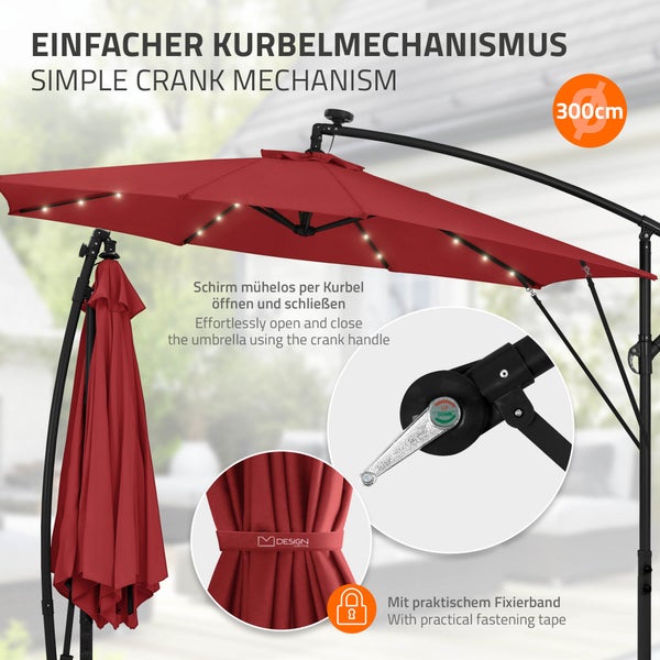 Ampelschirm mit Kurbelmechanismus und LED Beleuchtung, Durchmesser 300 Zentimeter, mit Fixierband für den zusammengeklappten Zustand.