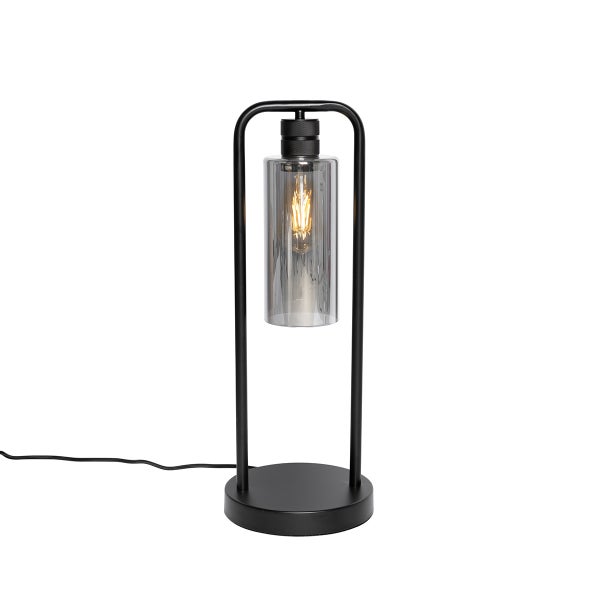 Schwarze Tischlampe aus Metall mit zylindrischem Rauchglas-Schirm und sichtbarem LED-Filament-Leuchtmittel.
