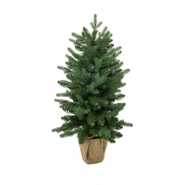 Geschmückter künstlicher Weihnachtsbaum im Jutesack