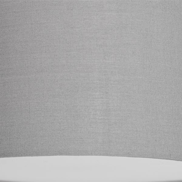 Detailansicht der gewebten Stoffoberfläche eines Lampenschirms.