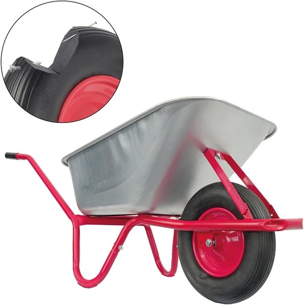 Japanische Anemone mit rosa Blüten und grünen Blättern im Garten.