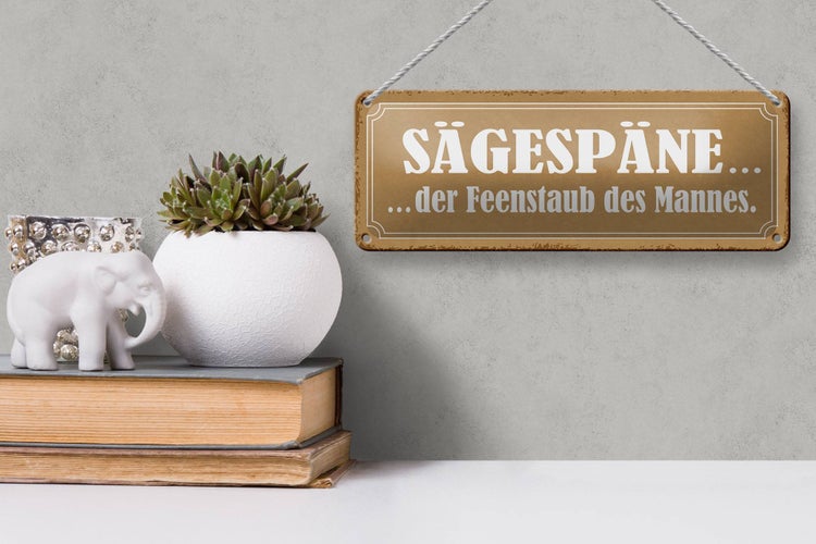 Blechschild Spruch 27x10cm Sägespäne der Feenstaub des Mannes beige Schild