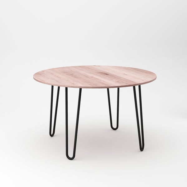 Runder Esstisch mit Holzplatte in Eichenoptik und schwarzen Metallbeinen im Haarnadel Design.