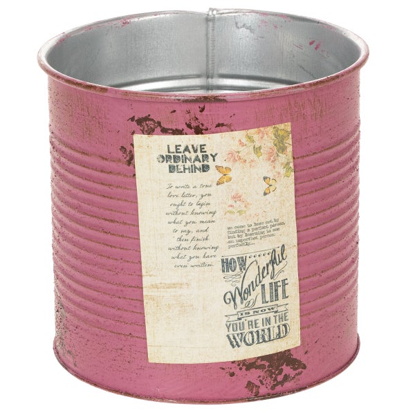 Rosa Metall-Übertopf im Vintage-Stil mit antikem Etikett und Blumenmotiv.