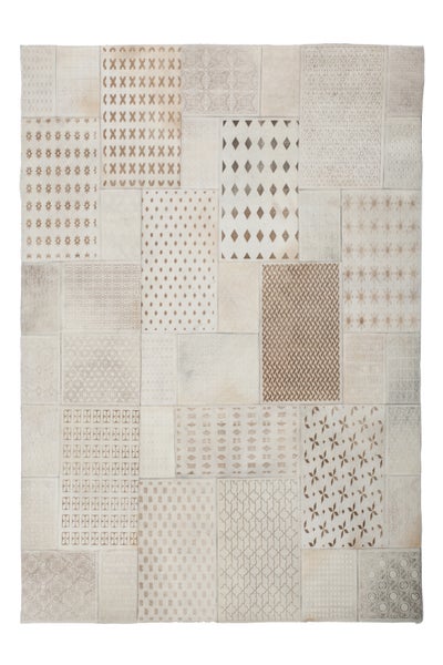Patchwork Teppich mit verschiedenen geometrischen Mustern aus Lederstücken in rechteckiger Form