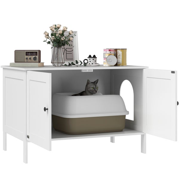 Weißer Katzentoilettenschrank aus Holz mit geöffneten Türen, einer Katze in der Katzentoilette, seitlichem Eingang und Dekoration auf der Ablage.