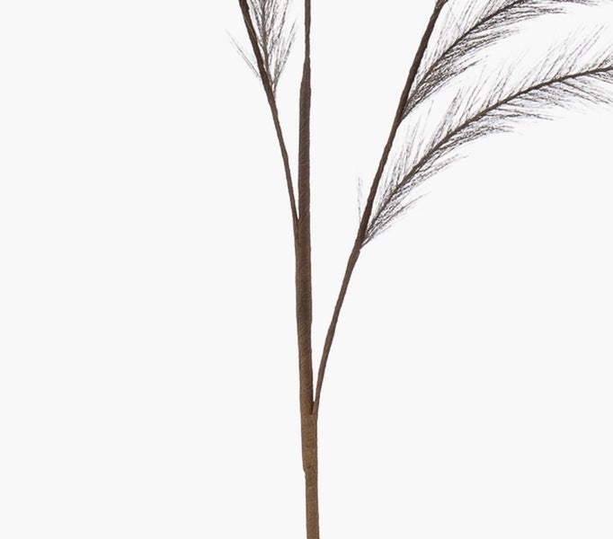 Künstlicher Dekozweig mit feinen, federartigen Wedeln zur Raumgestaltung.