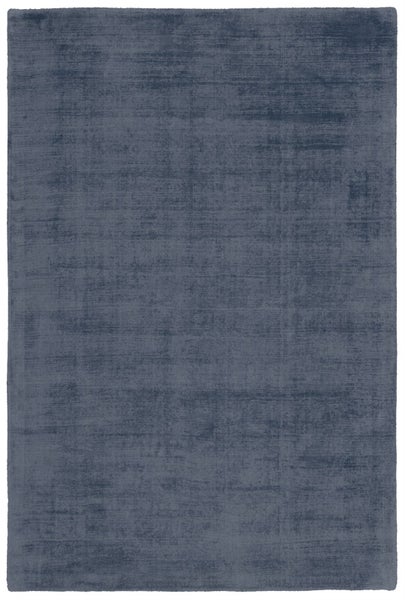 Rechteckiger Teppich in Blau mit strukturierter Oberfläche und Vintage-Optik.