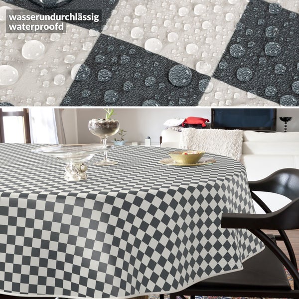 Wasserdichte Tischdecke mit Schachbrettmuster auf einem Esstisch.