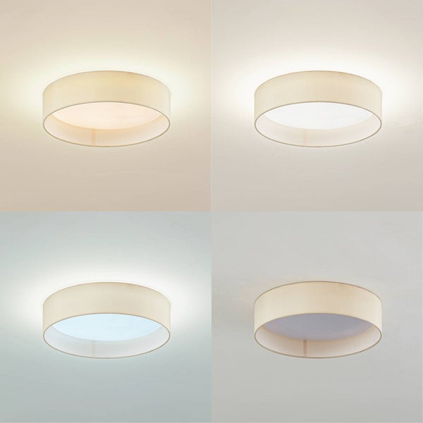 Runde Deckenleuchte mit Stoffschirm in verschiedenen Lichttemperaturen von warmweiß bis tageslichtweiß.