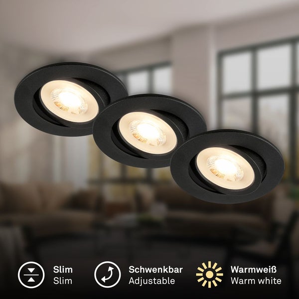 Drei schwarze, schwenkbare und schlanke Einbaustrahler mit warmweissem Licht