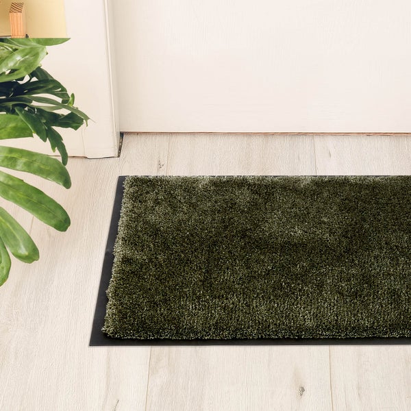 Schmutzfangmatte aus Textil vor einer Tür