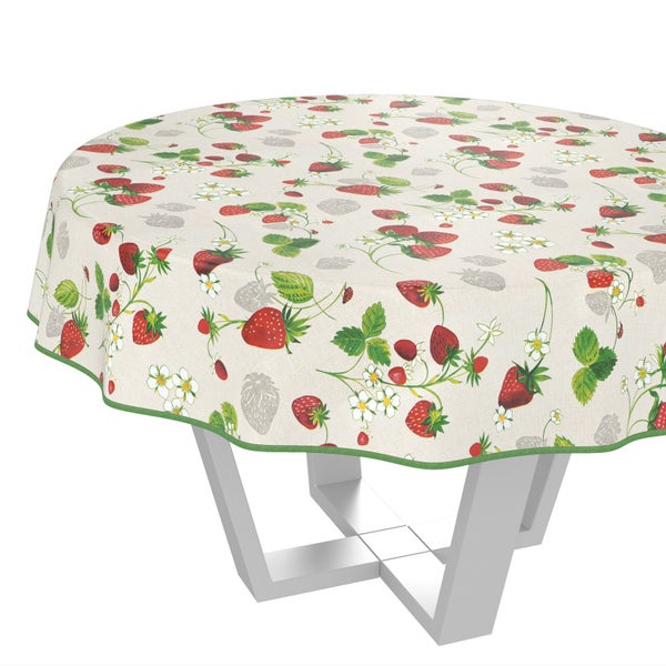 Runde Tischdecke mit Erdbeermuster auf einem Tisch