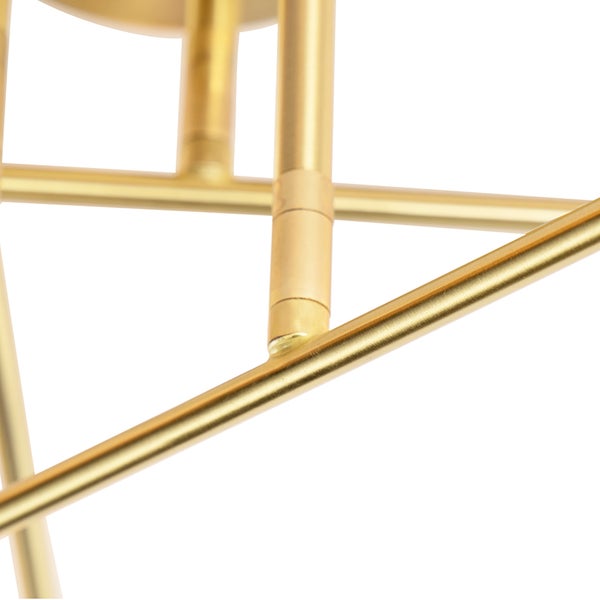 Detailaufnahme einer goldenen Deckenleuchte mit Metallstreben