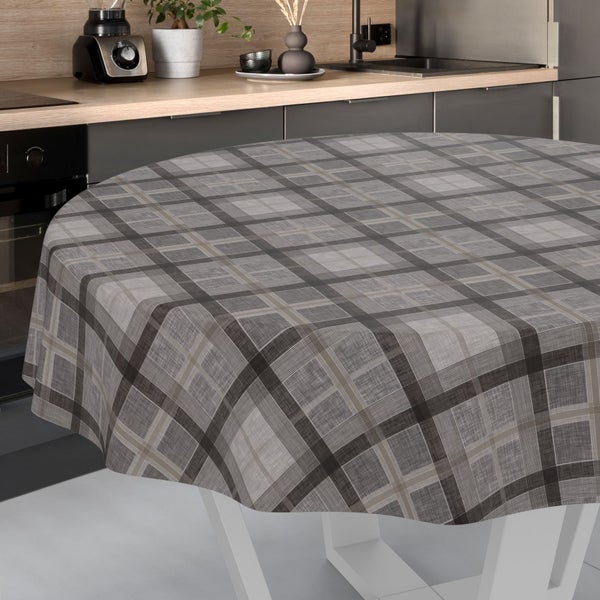 Runde Tischdecke mit Karo-Muster auf einem Tisch in einer hellen, modern eingerichteten Küche mit Arbeitsplatte in Holz-Optik.