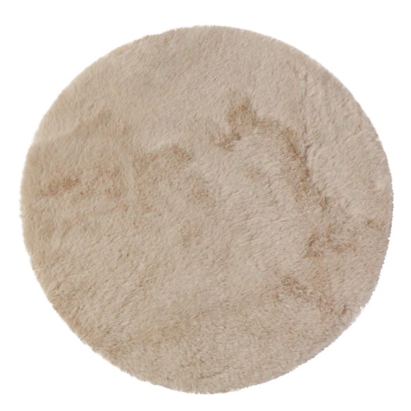 Runder, flauschiger Teppich in Beige aus weichem Kunstfell.
