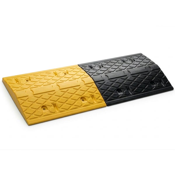 Modulare Fahrbahnschwelle aus Kunststoff in Gelb und Schwarz mit profilierter Oberfläche.