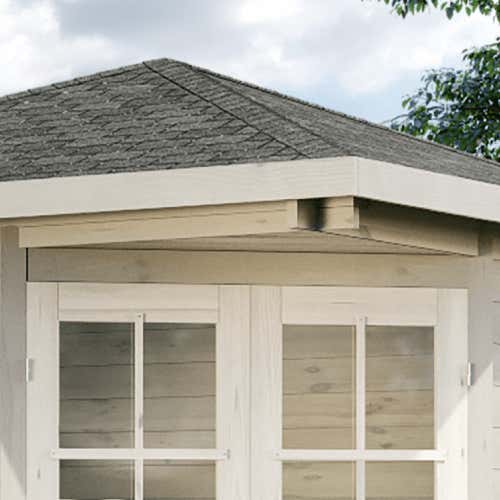 Detailansicht eines Gartenhauses mit grauem Dach und weißen Fenstern