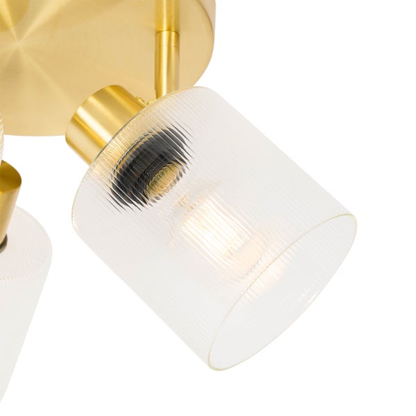 Deckenleuchte mit klarem Glas und goldfarbenen Elementen