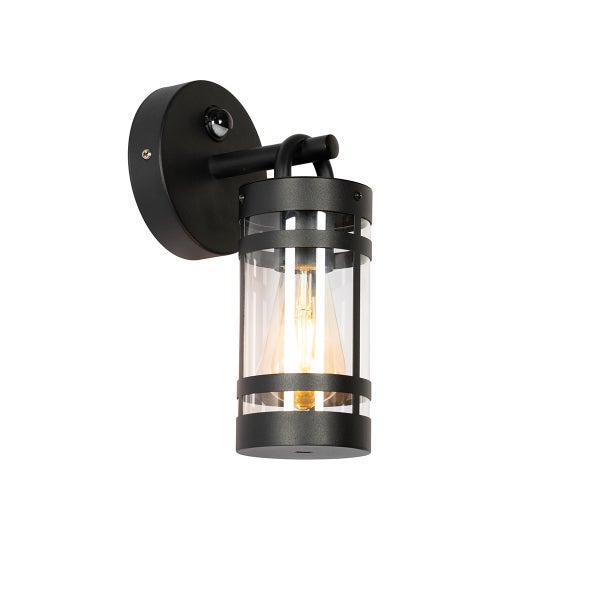 Außenwandleuchte mit Bewegungsmelder, zylindrische Form aus schwarzem Metall und klarem Glas mit sichtbarem Leuchtmittel.