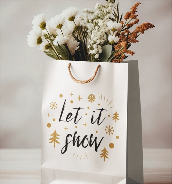 Dekorative Geschenktüte mit Blumen und Wintermotiv