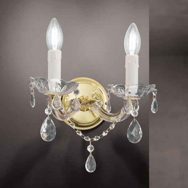 Zweiflammige Wandleuchte im klassischen Stil mit Kristallbehang und goldfarbener Oberfläche.