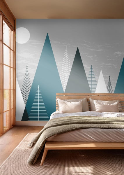 Helles Schlafzimmer mit Bergmotivtapete, Holzbett und Teppich.