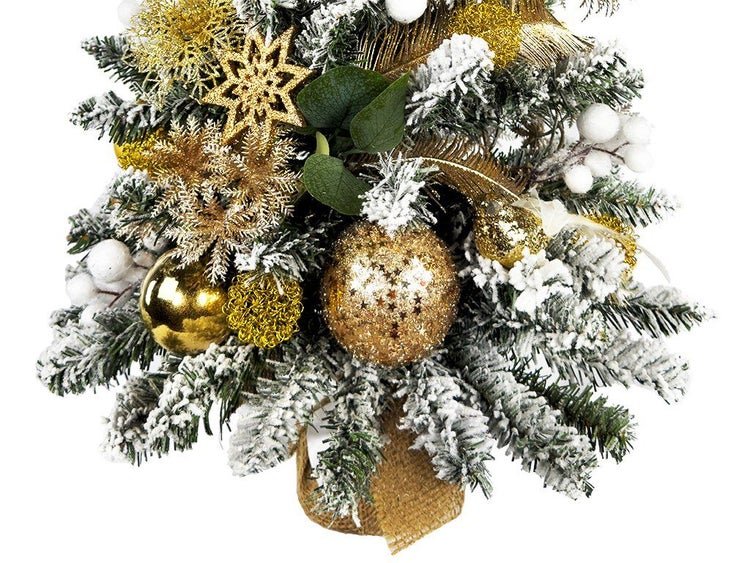 Künstlicher Weihnachtsbaum mit Schnee, Kugeln und Sternen, in Jutesack dekoriert
