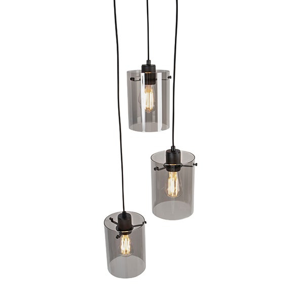 Moderne dreiflammige Pendelleuchte mit drei zylindrischen Glasschirmen und sichtbaren Leuchtmitteln für eine stimmungsvolle Beleuchtung.